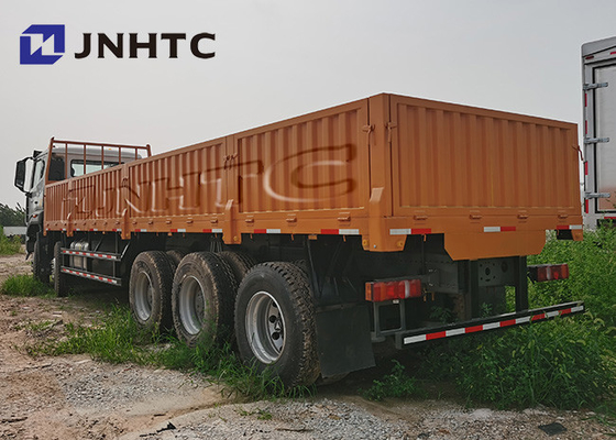 Sinotruk 8x4 Hohan Flat Back Trucks 31tons Lhd With Lifting Axle